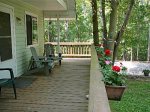Front covered porch w/ adirondack chairs